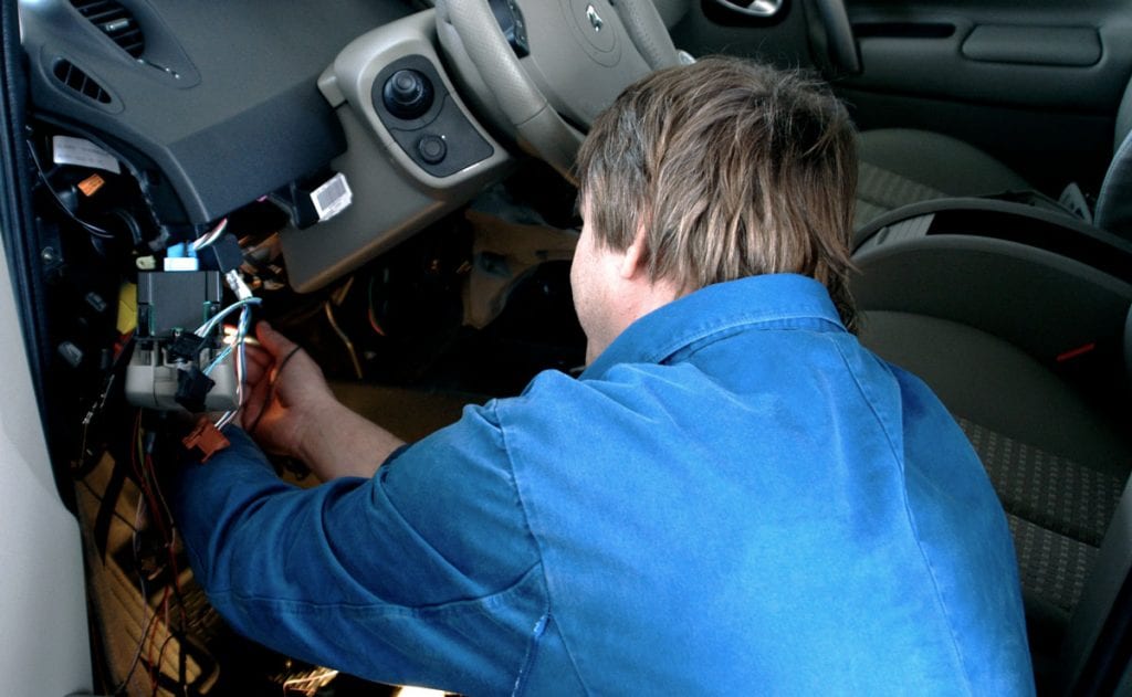 Expert Technicians Installing Remote Car Starters